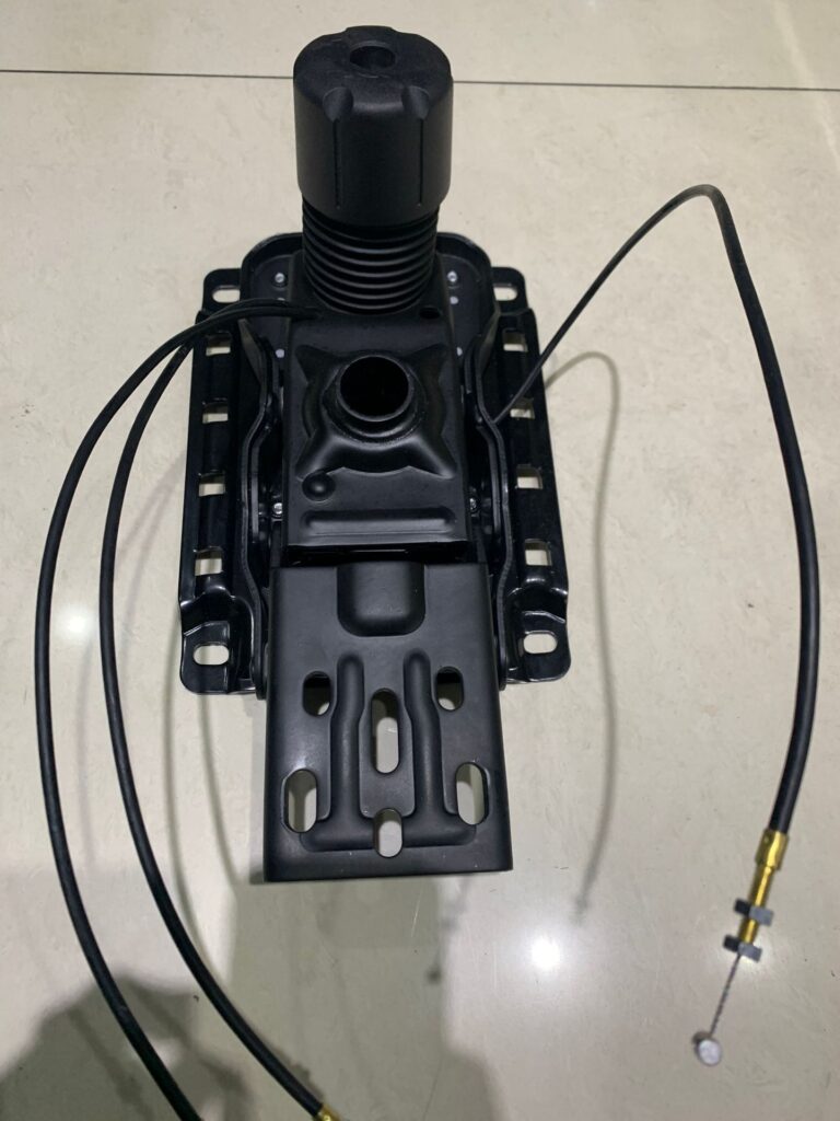 Cable-controlled office chair mechanism with dual wire control cables for high-end ergonomic seating repair.